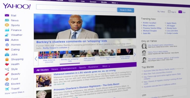 Yahoo homepage displaying news articles, trending topics, and a prominent image of a man in a suit with a serious expression.